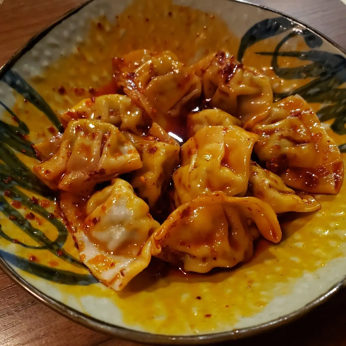 Chicken Dumpling in Red Chilli Sauce 紅油雞餃